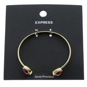 Express gold open C crystal w/red stones bracelet